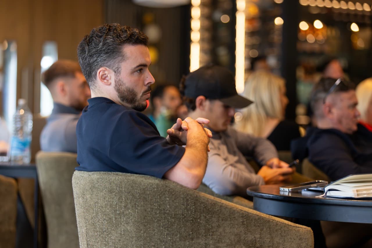 An attendee following a session at Sópers House