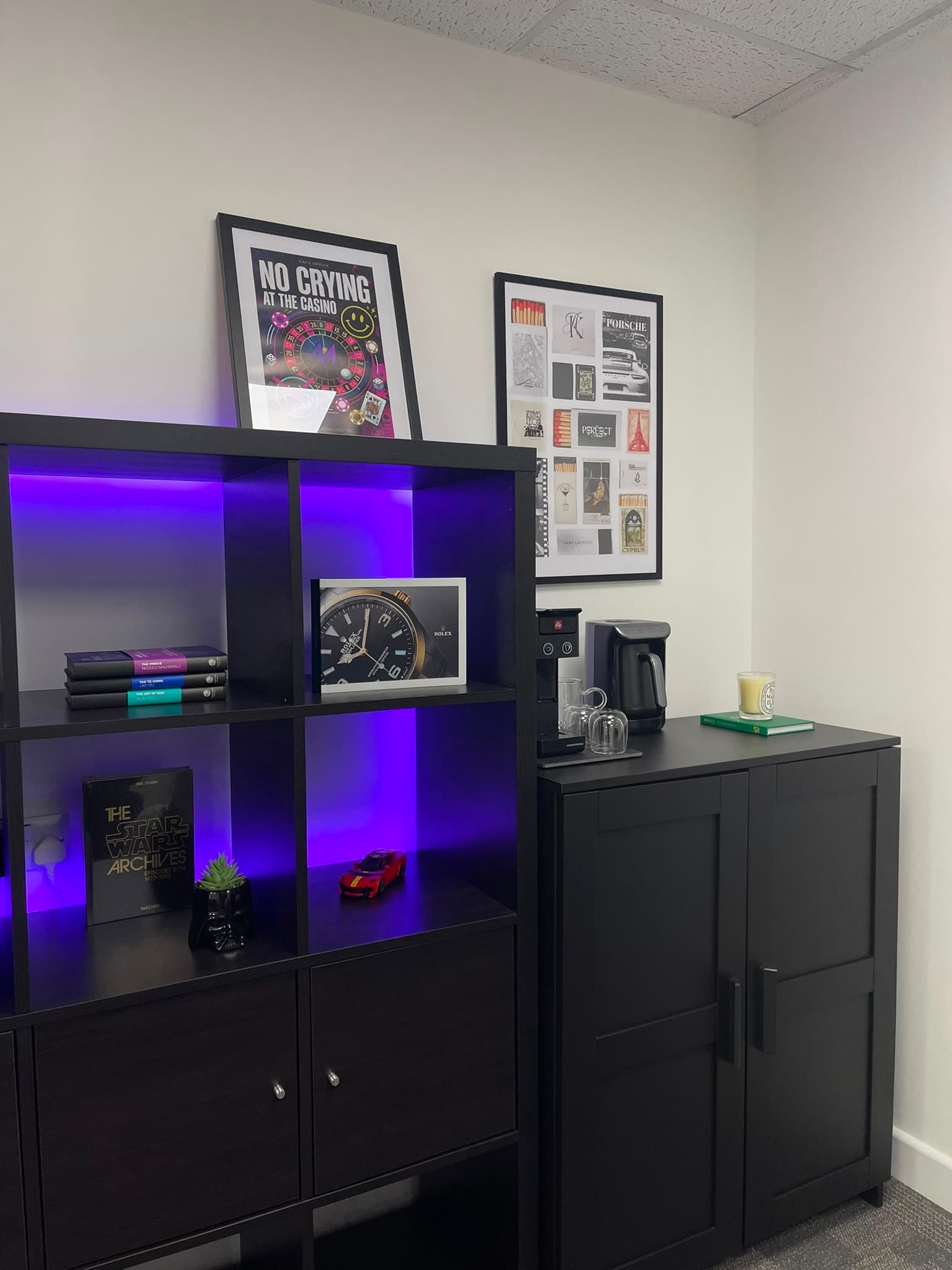 Books and objects on a shelf in the Montaj Digital office