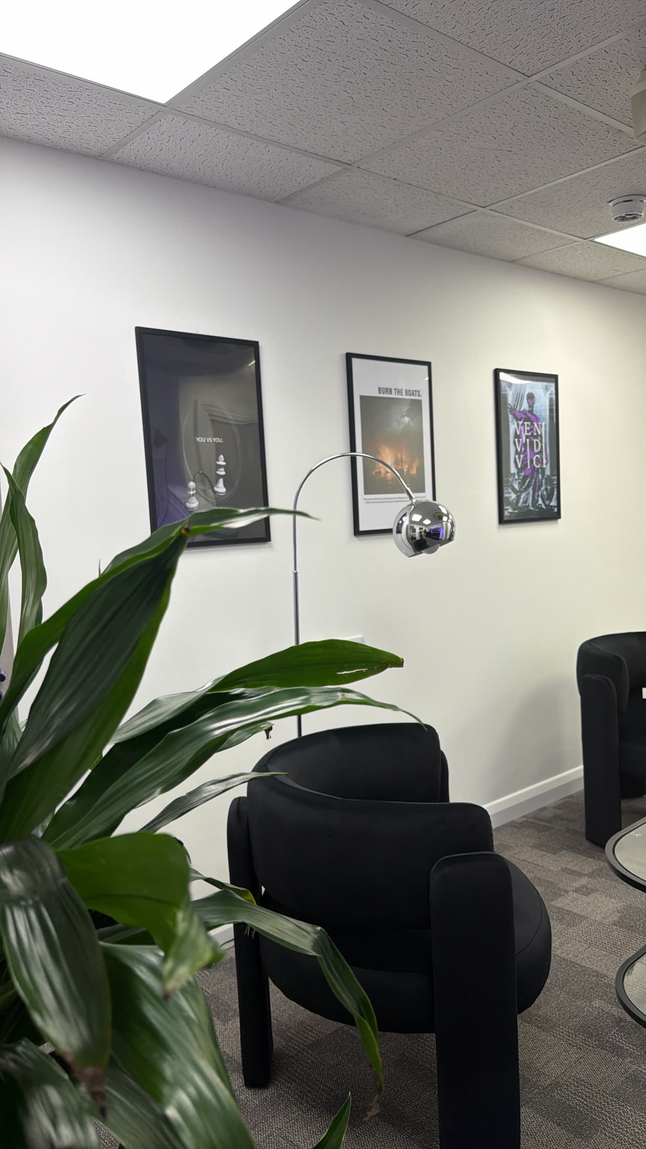 Framed prints on the wall of the Montaj Digital lounge